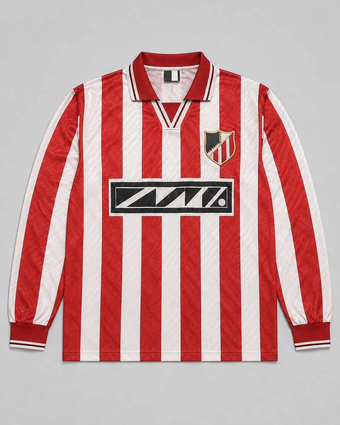An authentic original football shirt with an embroidered crest, woven fabric and period-correct collar