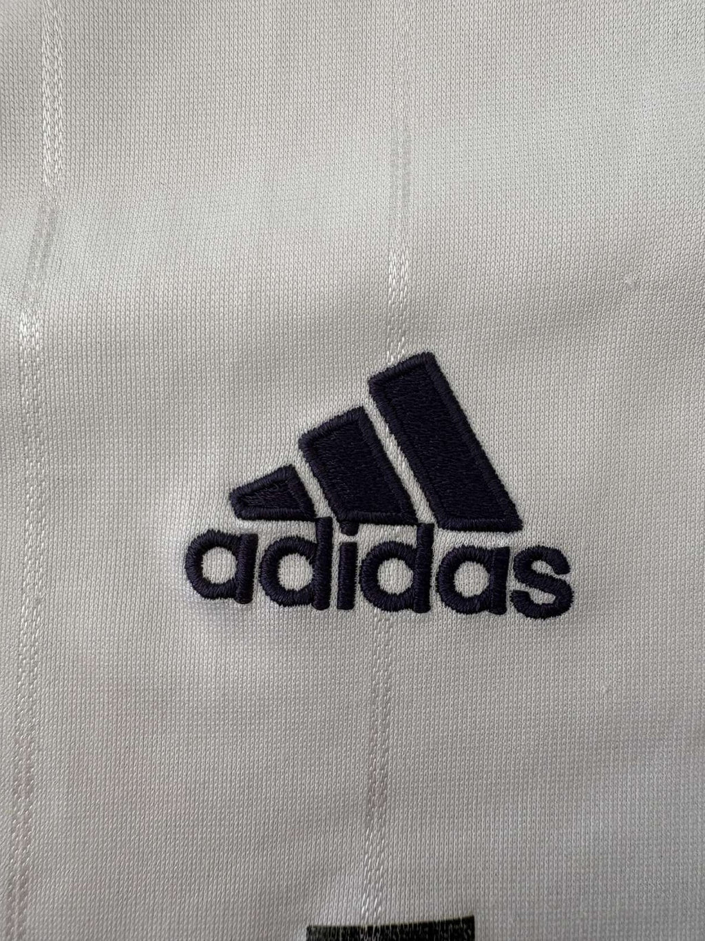 adidas branding on the 2012/13 Real Madrid home shirt