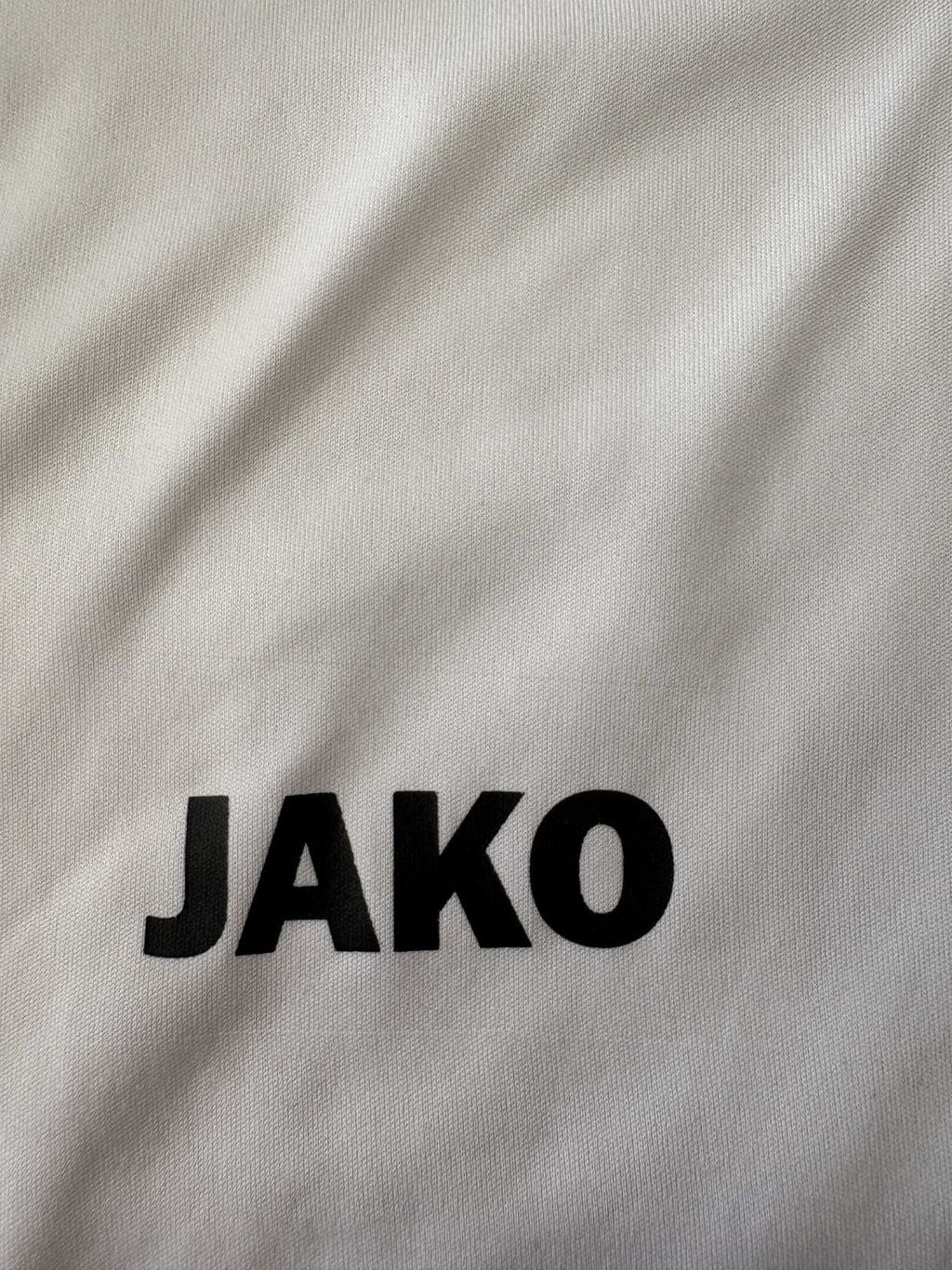 JAKO branding on the 2018/19 VfR Krefeld-Fischeln home shirt