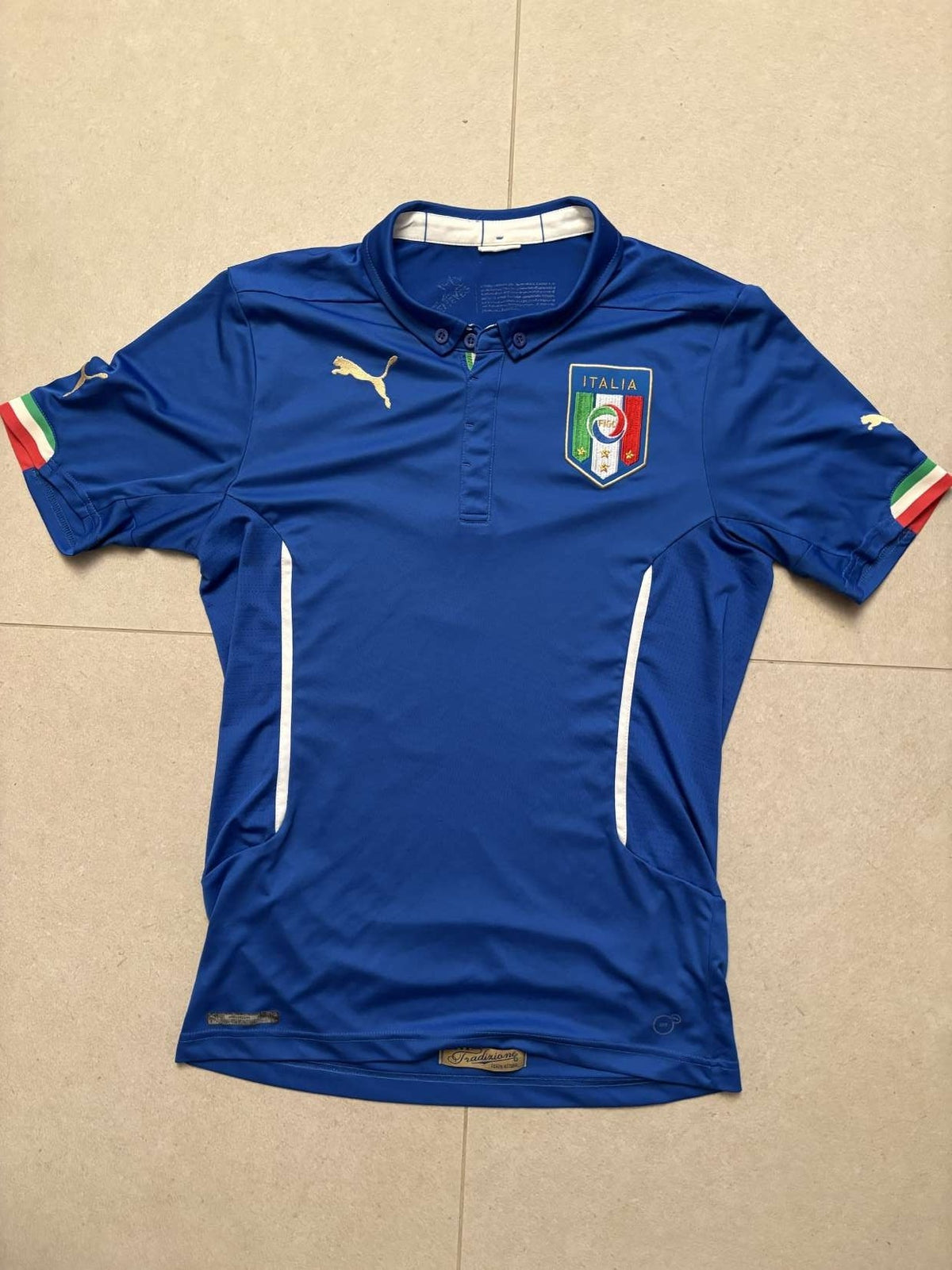 2014 Italy home shirt in blue, front, Puma