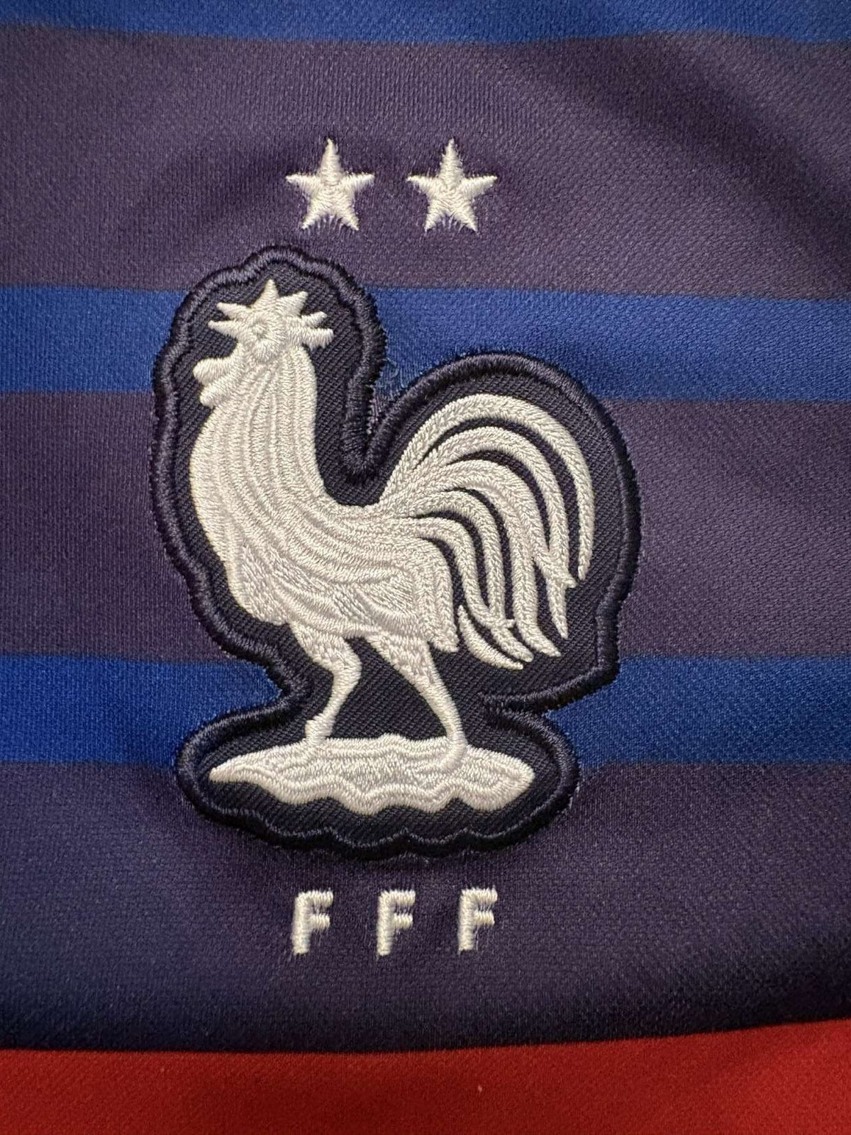 France crest on the 2020 France home shirt