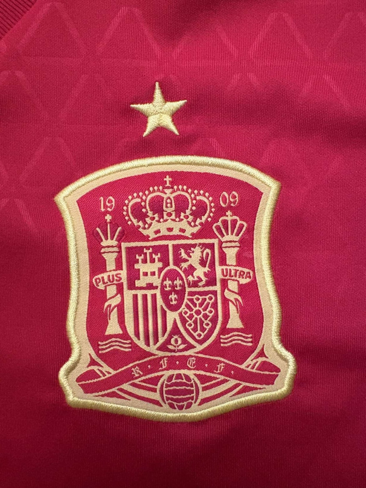 Spain crest on the 2016 Spain home shirt