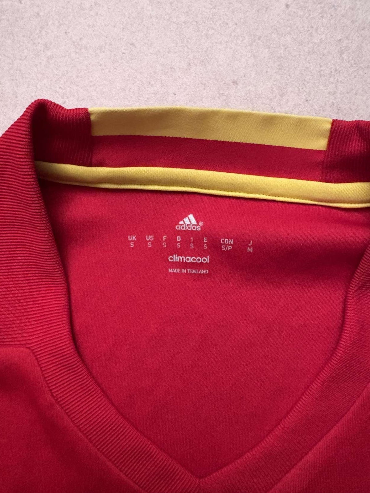 Neck detail on the 2016 Spain home shirt
