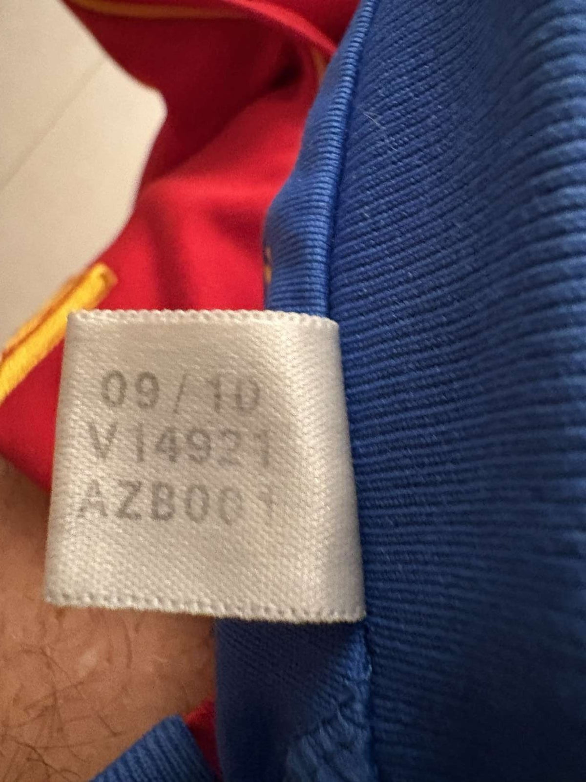 Inner label showing the product code of the 2010/11 Spain home shirt