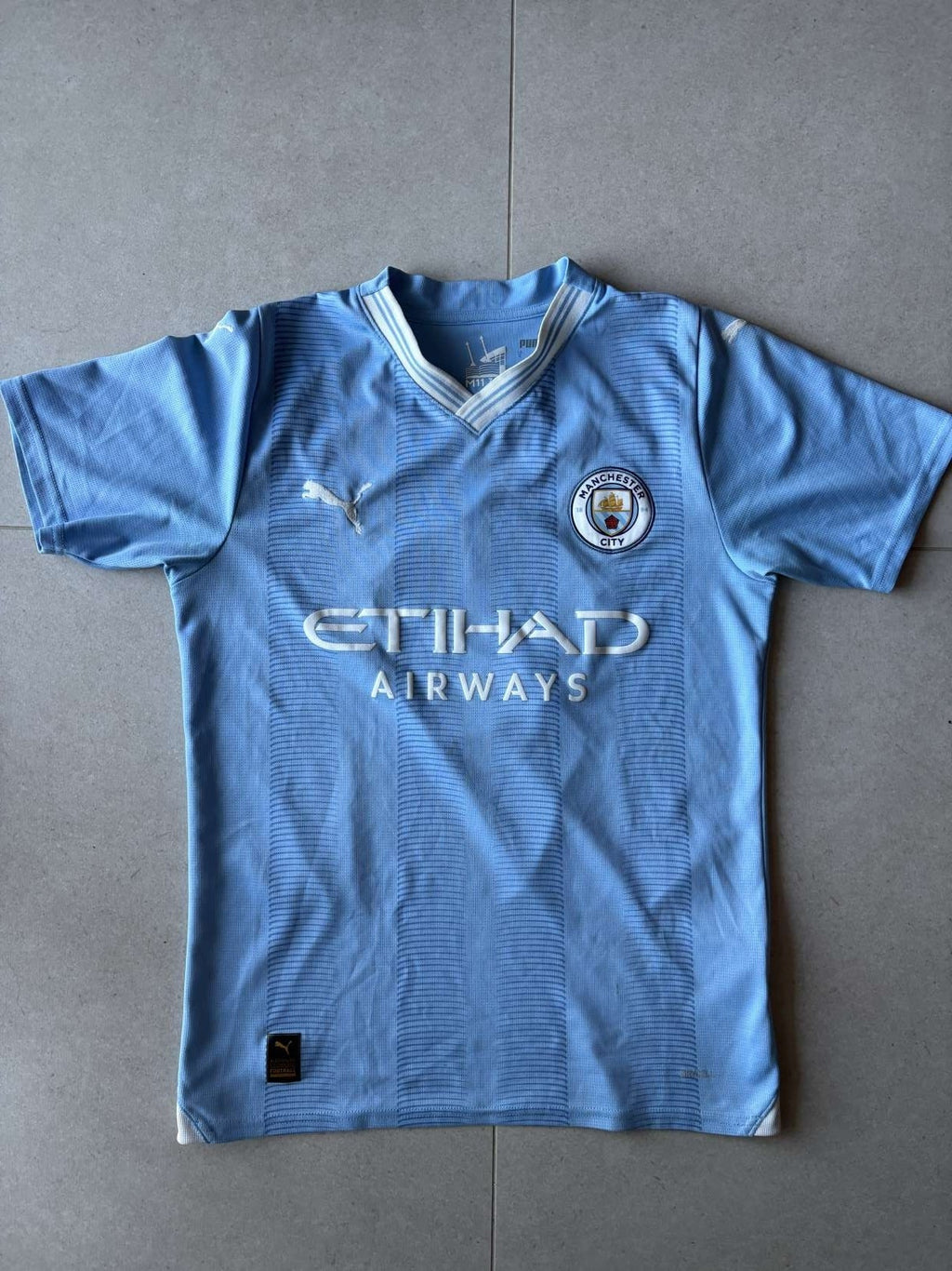 2023/24 Manchester City home shirt in sky blue, front, Puma