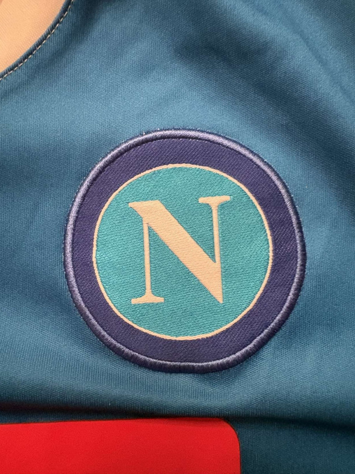 Napoli crest on the 2016/17 Napoli away shirt