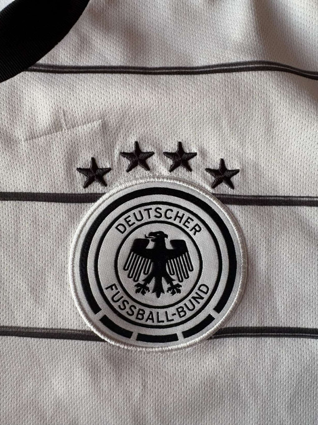Germany crest on the 2020 Germany home shirt