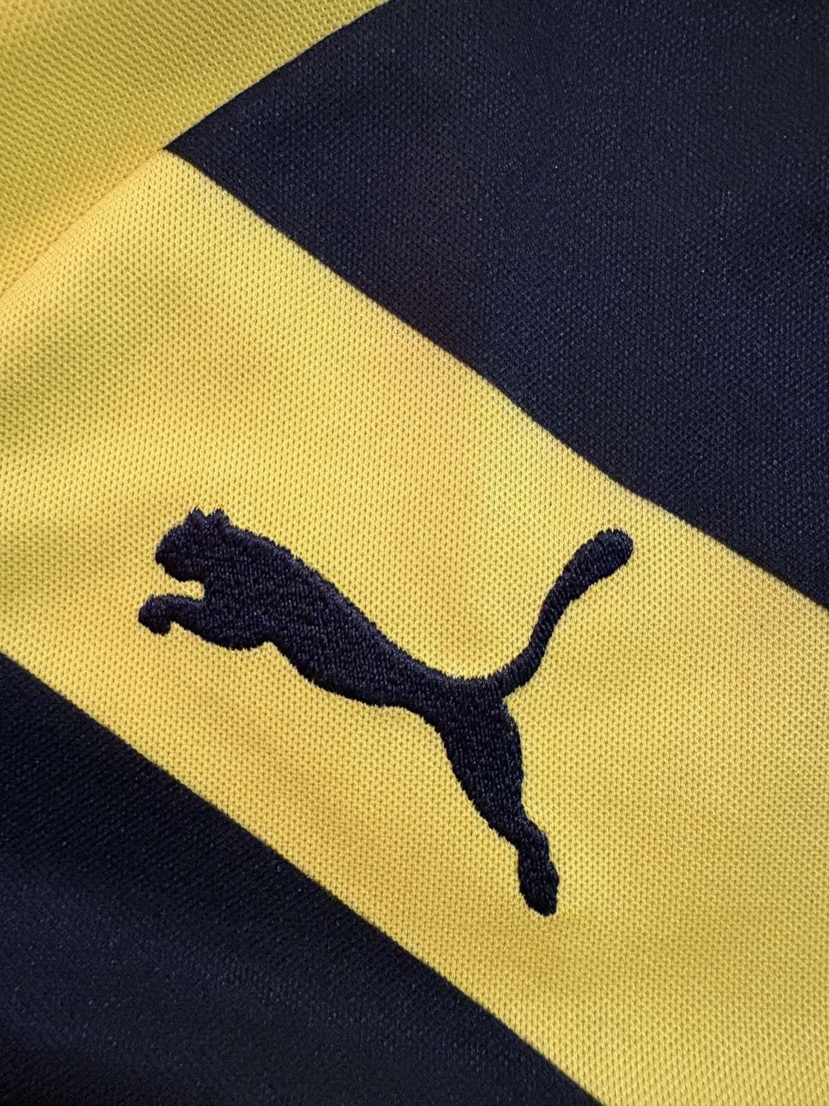 Puma branding on the 2014/15 Borussia Dortmund home shirt
