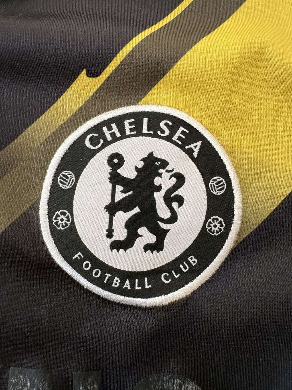 Chelsea club crest on the 2012/13 third shirt