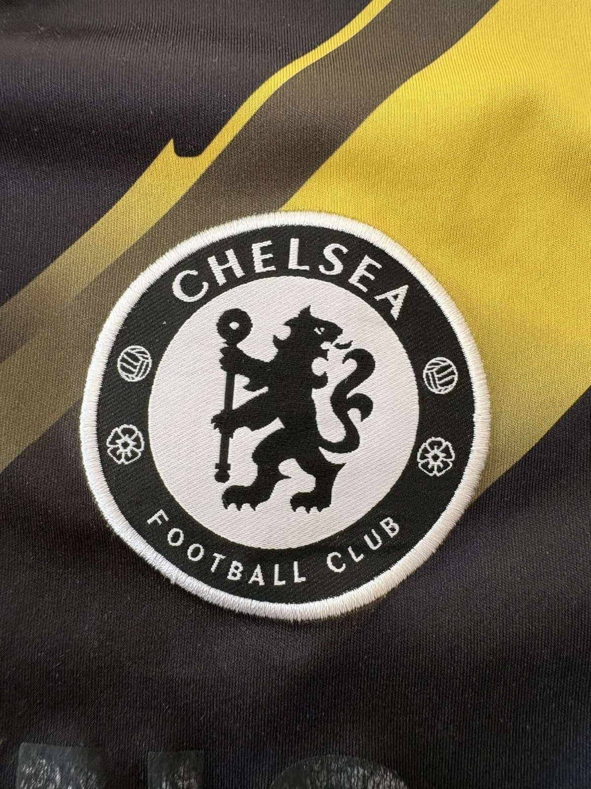 Chelsea club crest on the 2012/13 third shirt