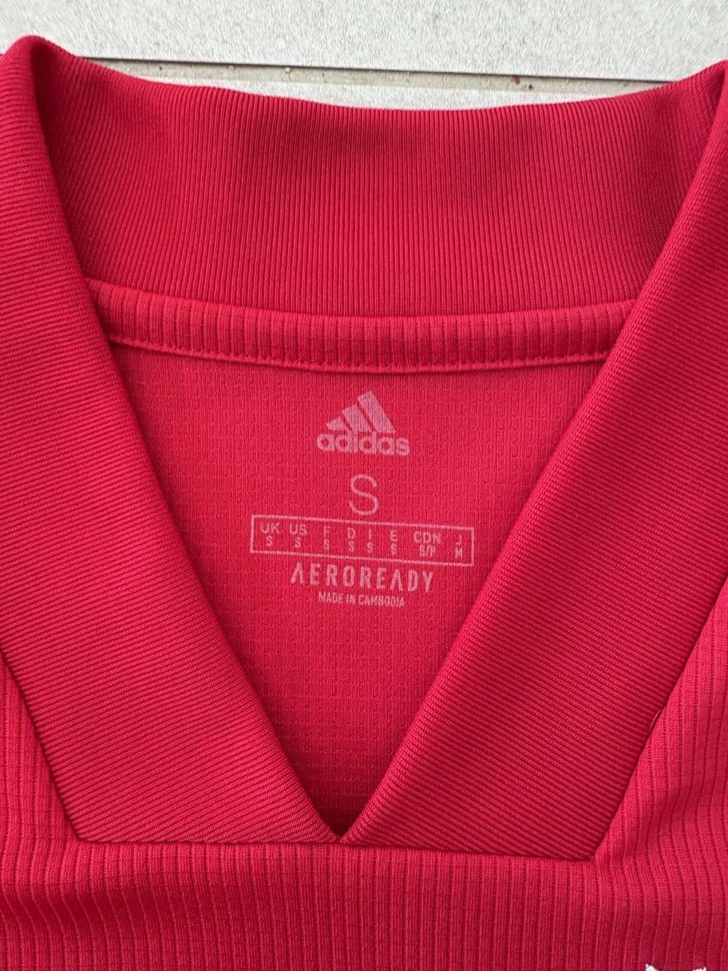 Neck and collar detail on the 2020/21 Ajax home shirt