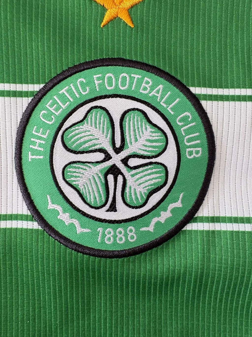 Celtic club crest on the 2021/22 home shirt