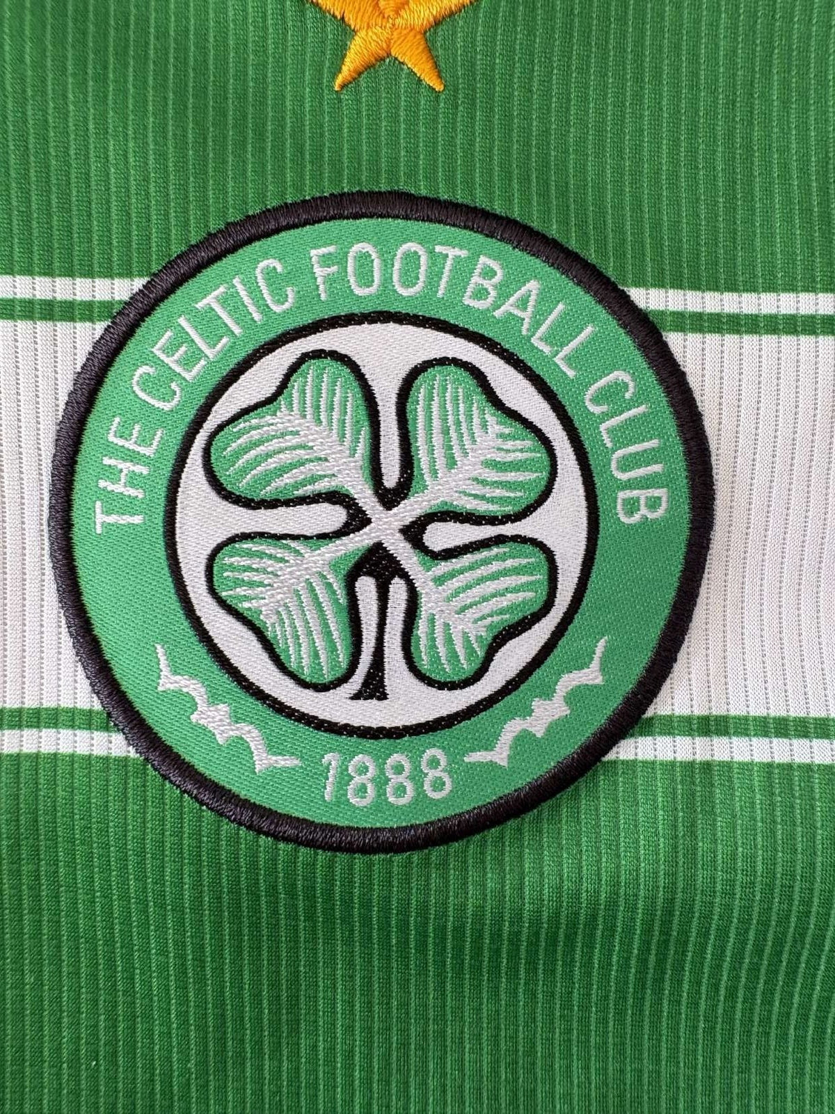 Celtic club crest on the 2021/22 home shirt