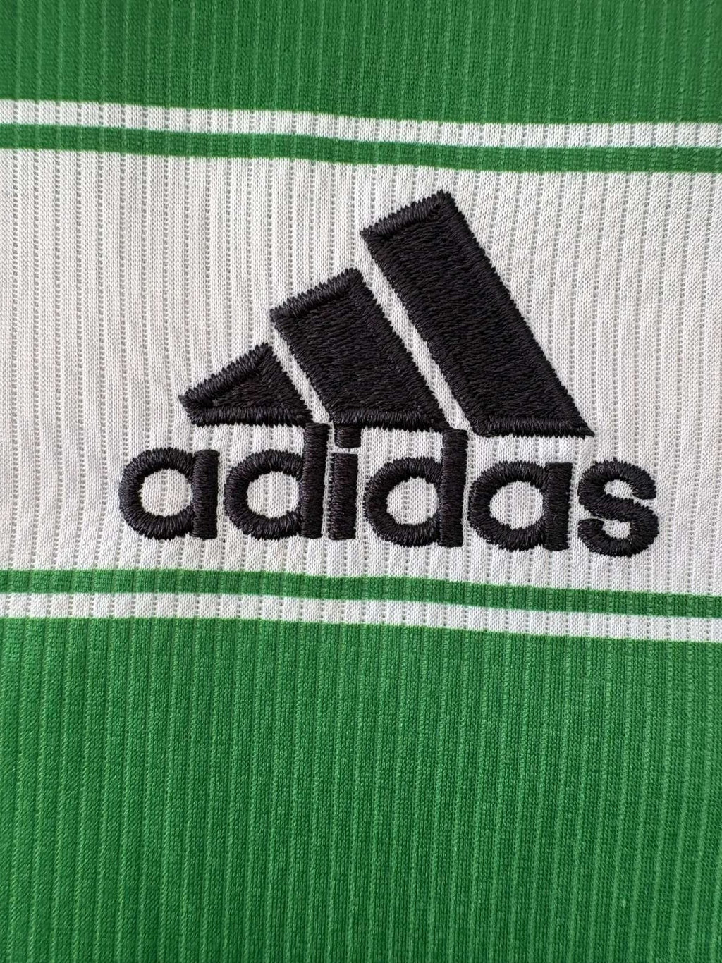 adidas branding on the 2021/22 Celtic home shirt
