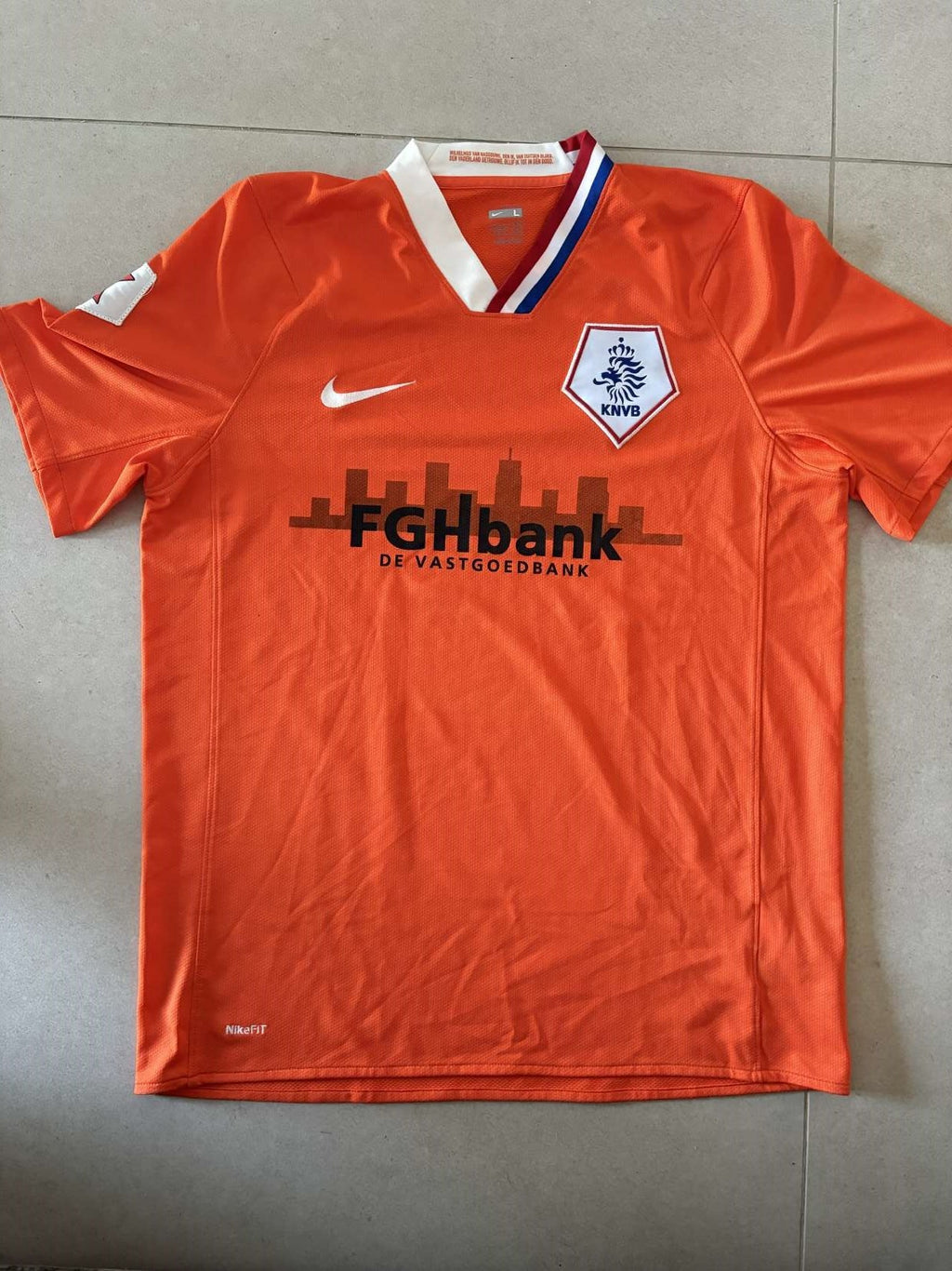 2008 Holland home shirt in orange, front, Nike with FGHbank logo