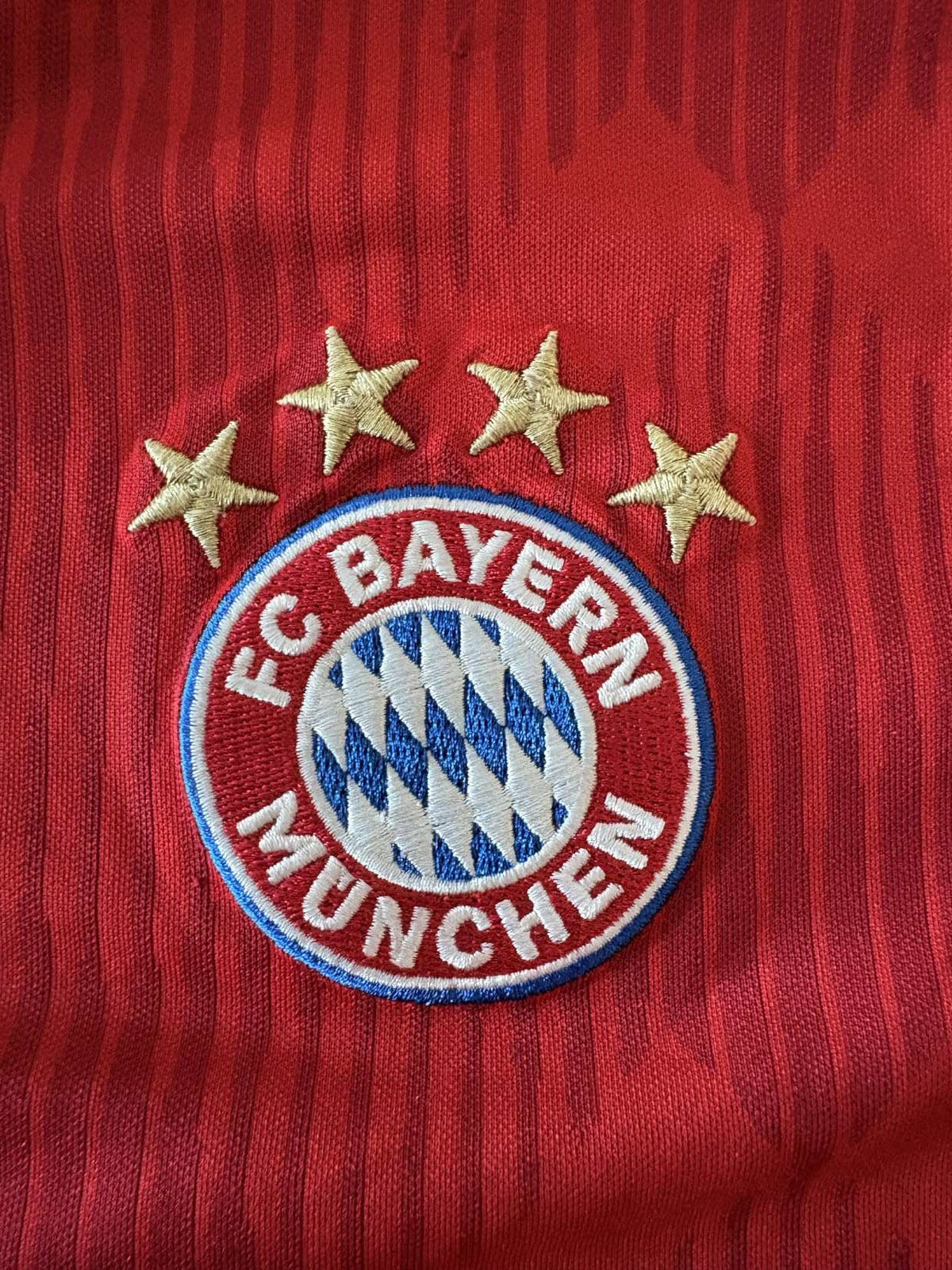 Bayern Munich crest on the 2018/19 home shirt