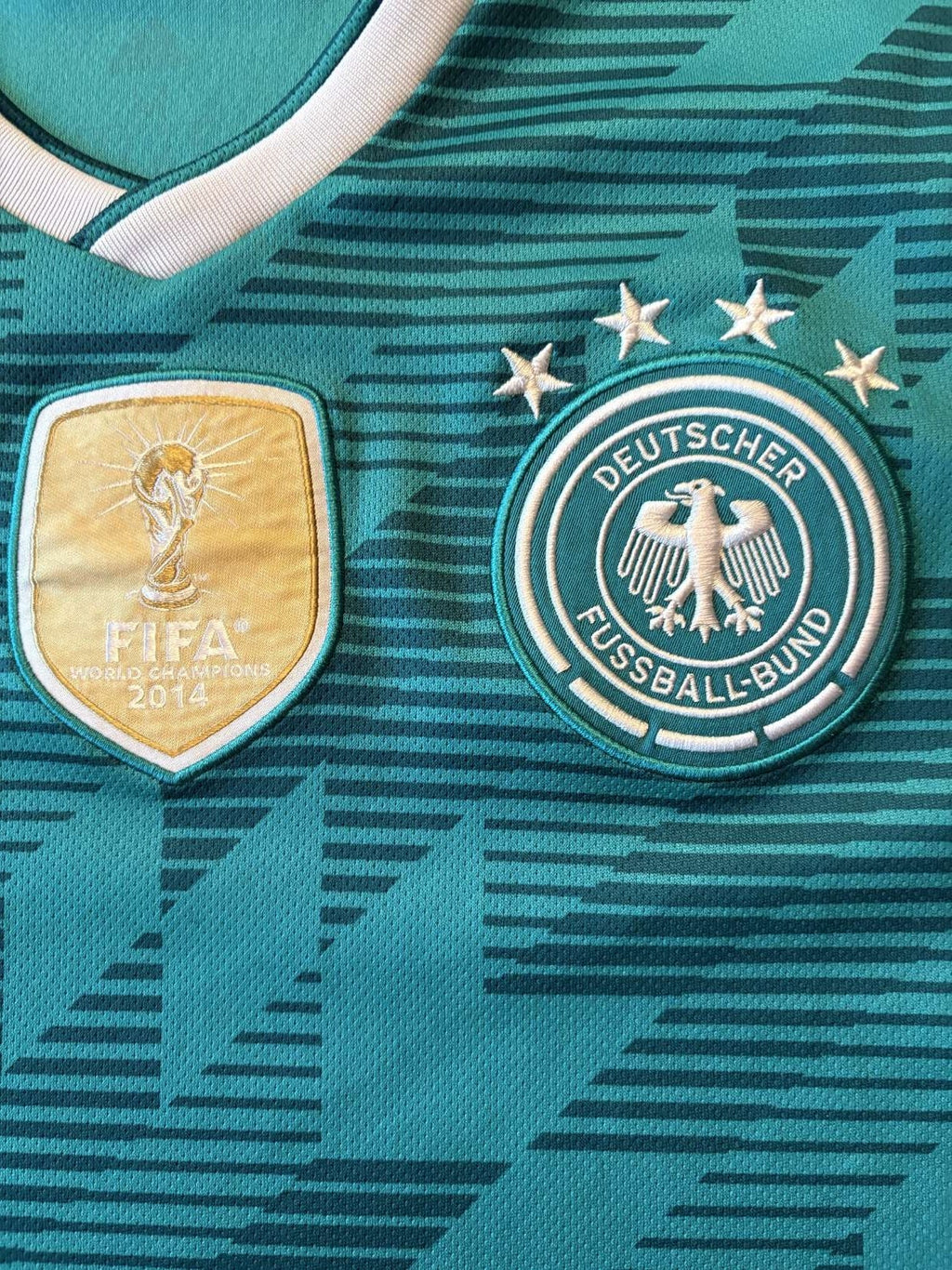 Germany crest and world champions badge on the 2018 away shirt