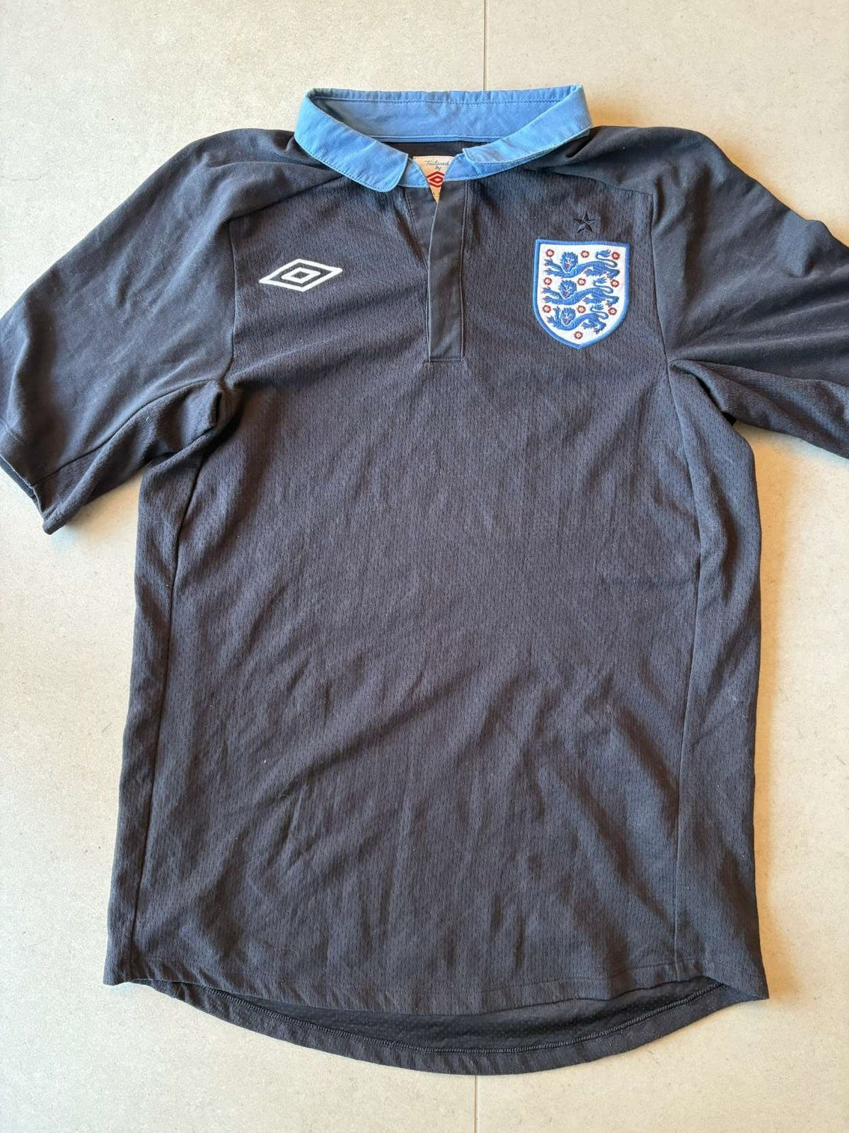 2011/12 England away shirt in navy, front, Umbro