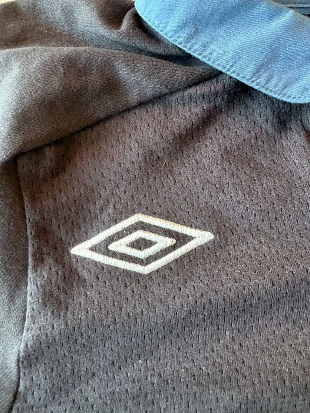 Umbro diamond on the 2011/12 England away shirt