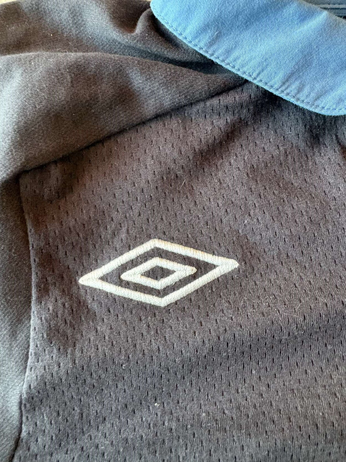 Umbro diamond on the 2011/12 England away shirt