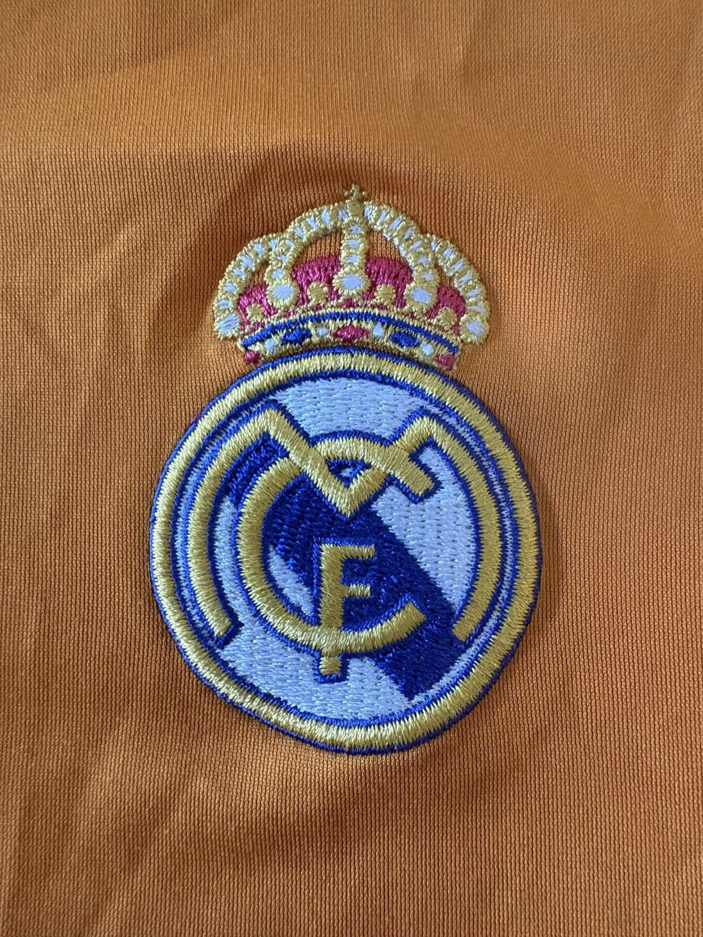 Real Madrid crest on the 2013/14 Real Madrid third shirt