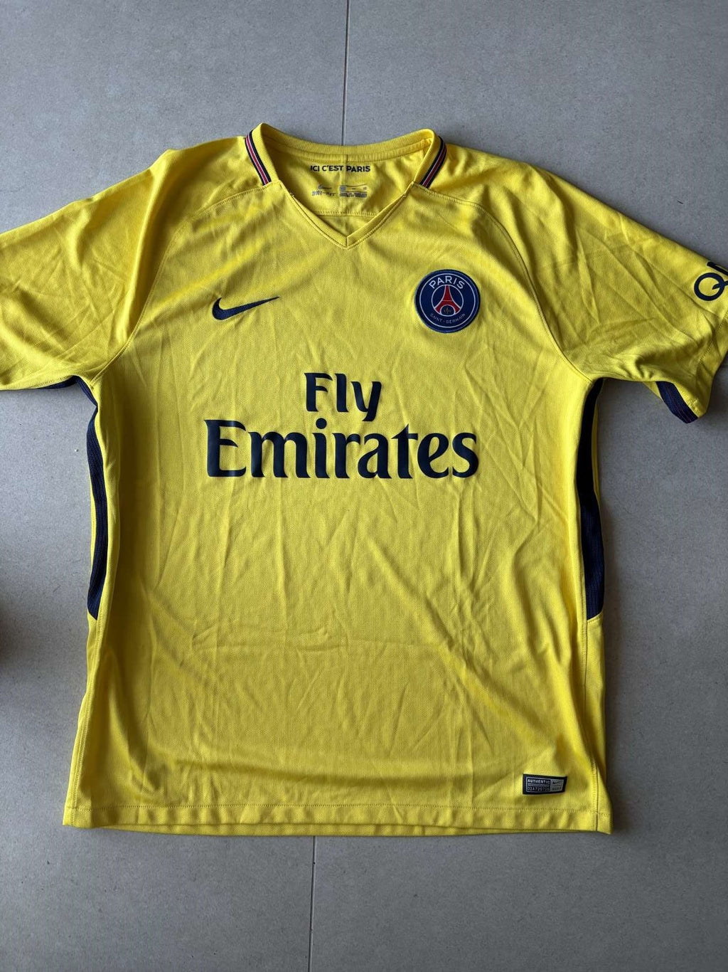 2017/18 Paris Saint-Germain away shirt in yellow, front, Nike