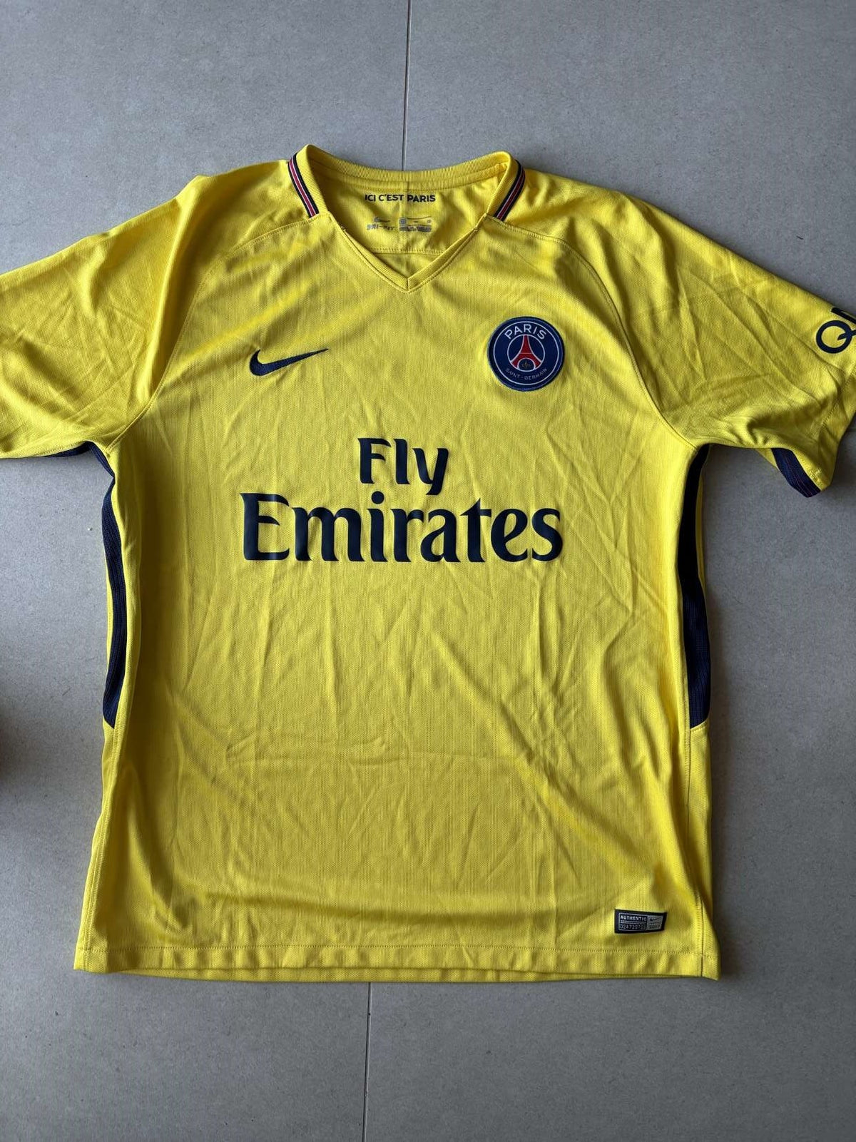 2017/18 Paris Saint-Germain away shirt in yellow, front, Nike