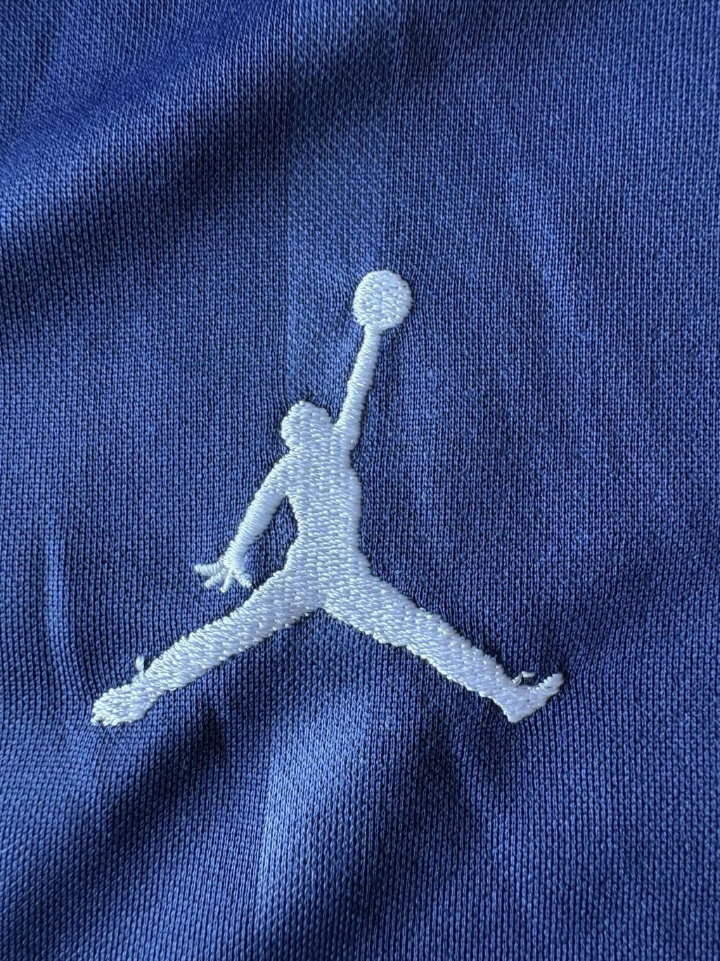 Jordan logo on the 2021/22 Paris Saint-Germain home shirt
