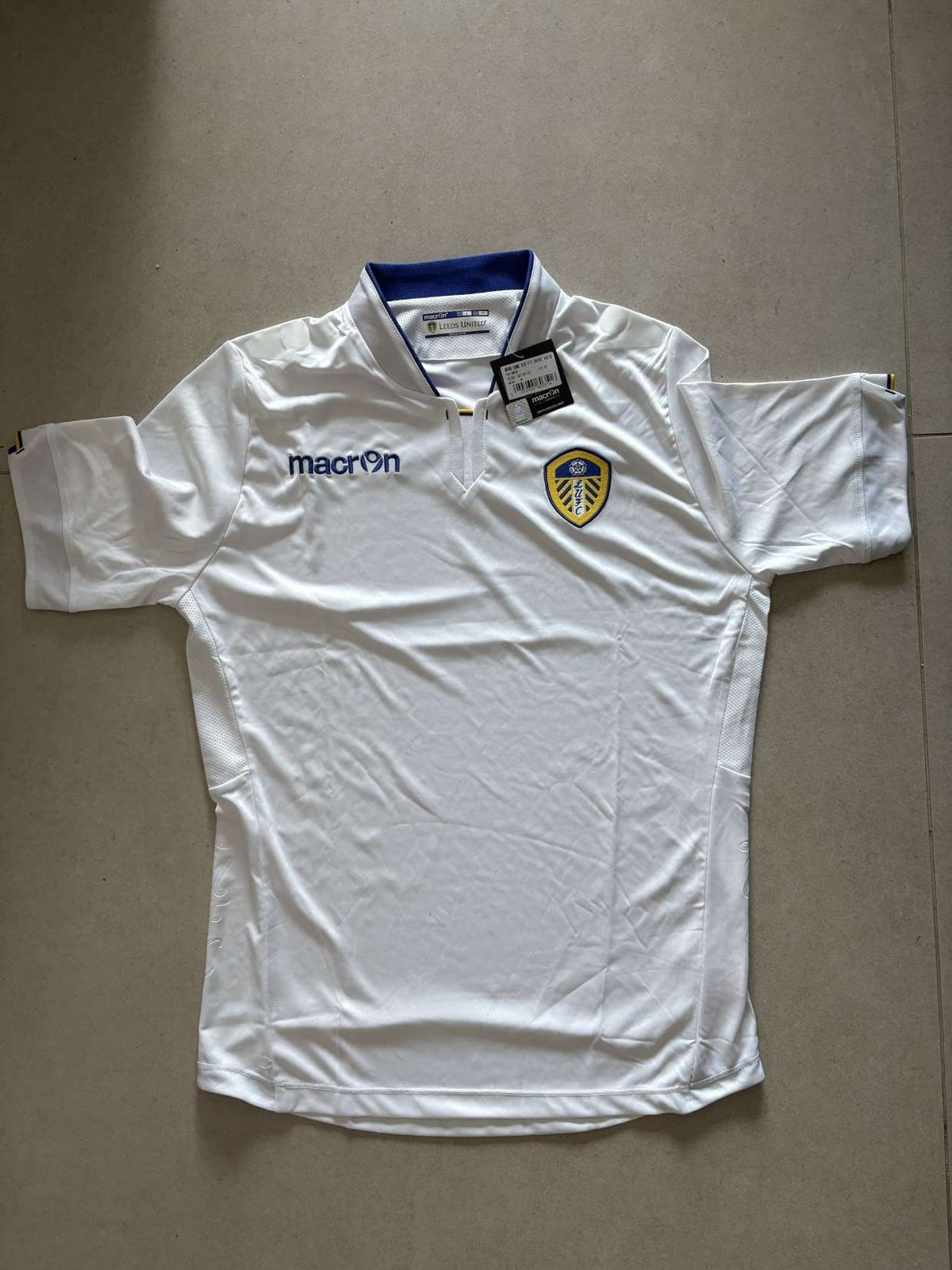 2014/15 Leeds United home shirt, front, Macron