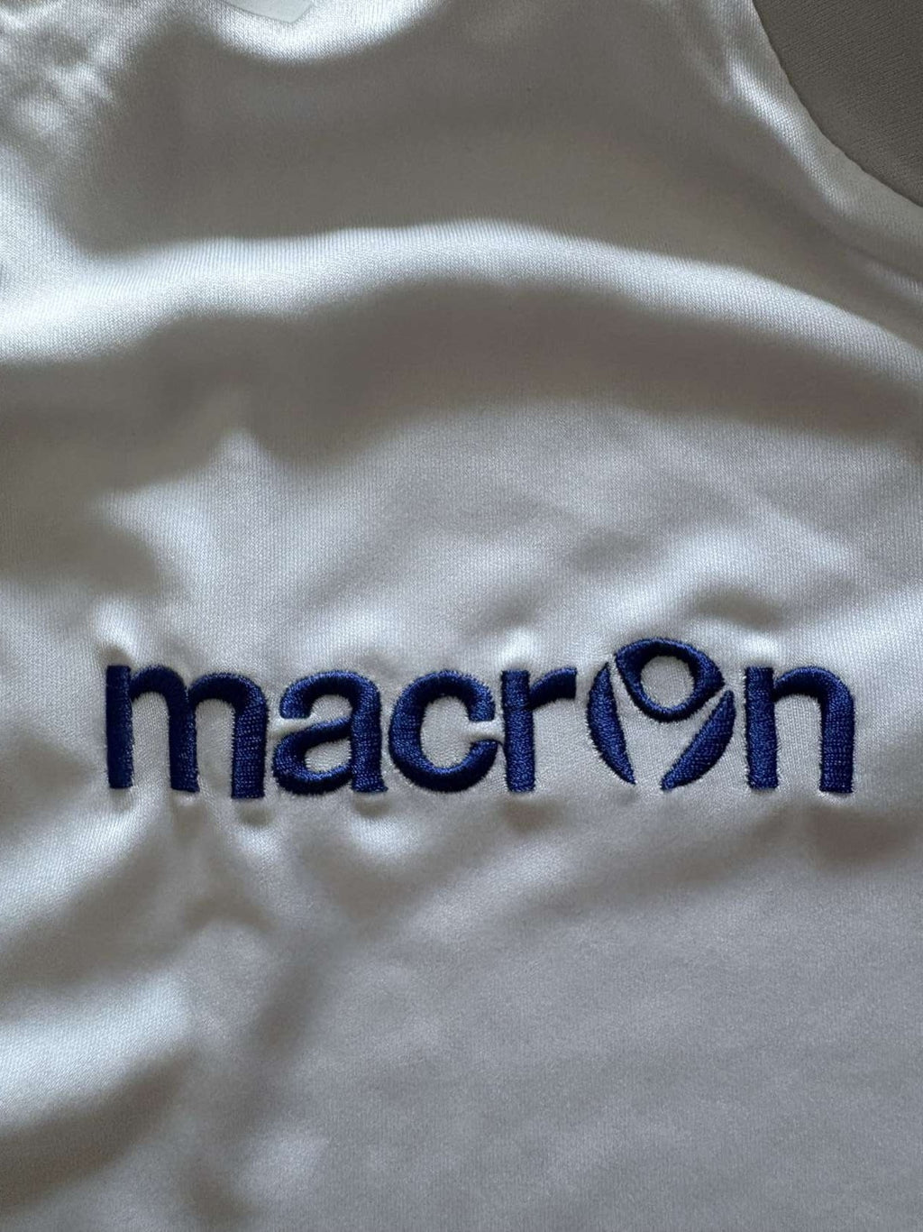 Macron branding on the 2014/15 Leeds United home shirt