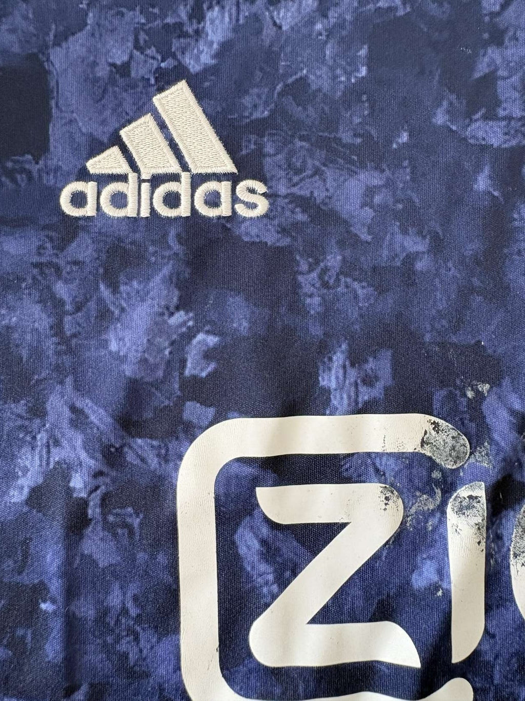 adidas logo on the 2017/18 Ajax away shirt