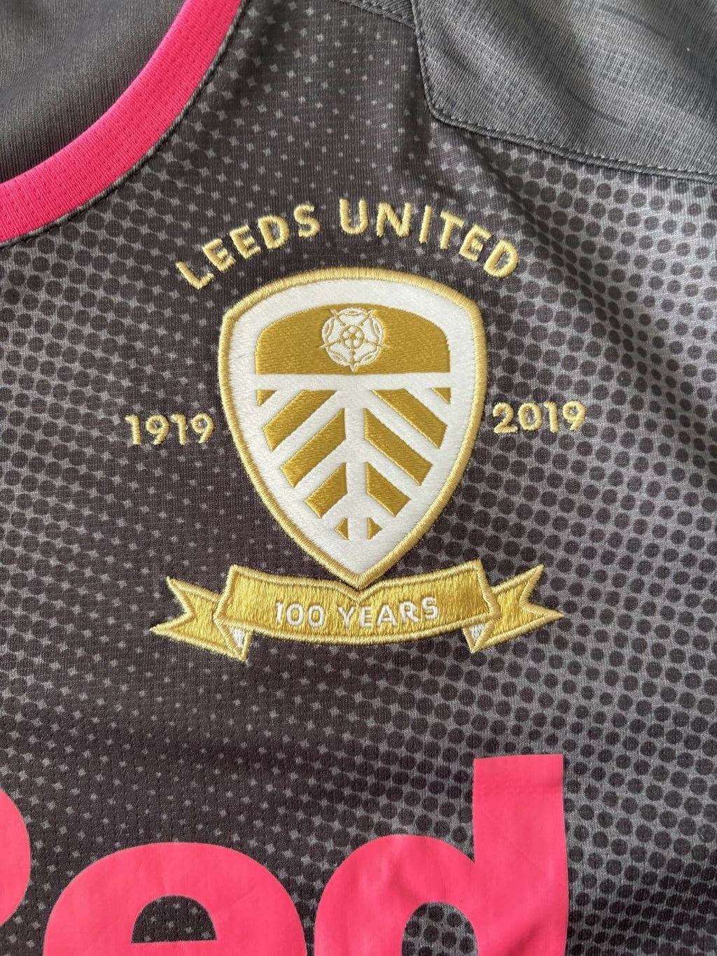 Leeds United centenary crest on the 2019/20 away shirt