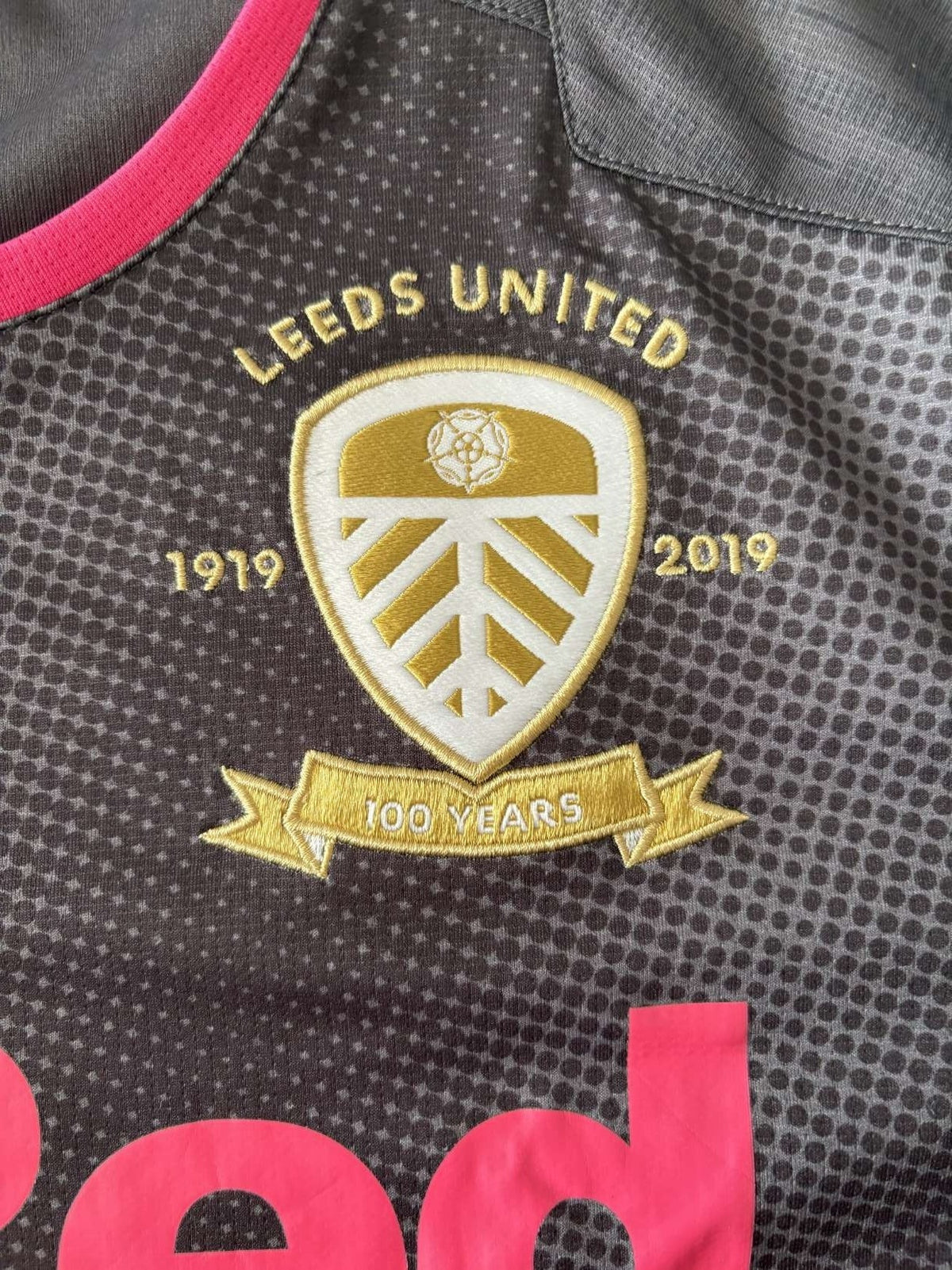 Leeds United centenary crest on the 2019/20 away shirt