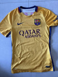 2015/16 Barcelona away shirt in gold, front, with Qatar Airways sponsor