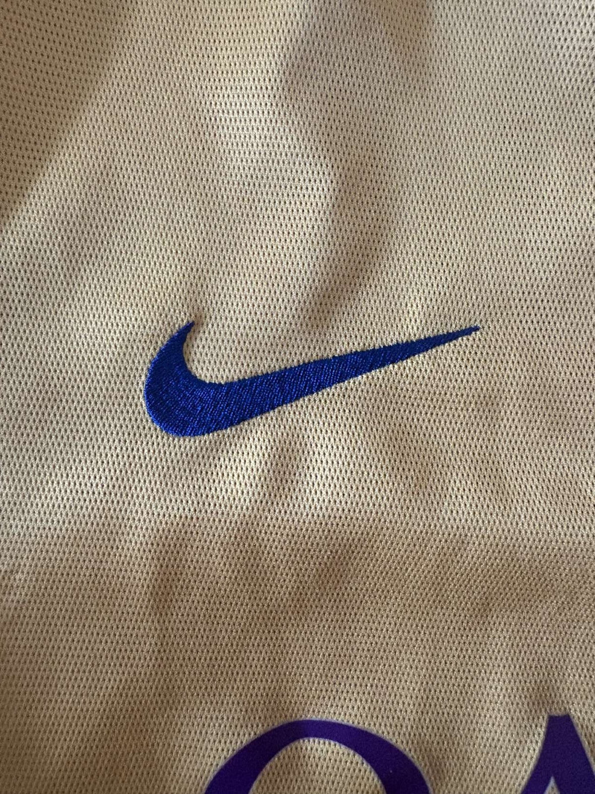 Nike swoosh detail on the 2015/16 Barcelona away shirt