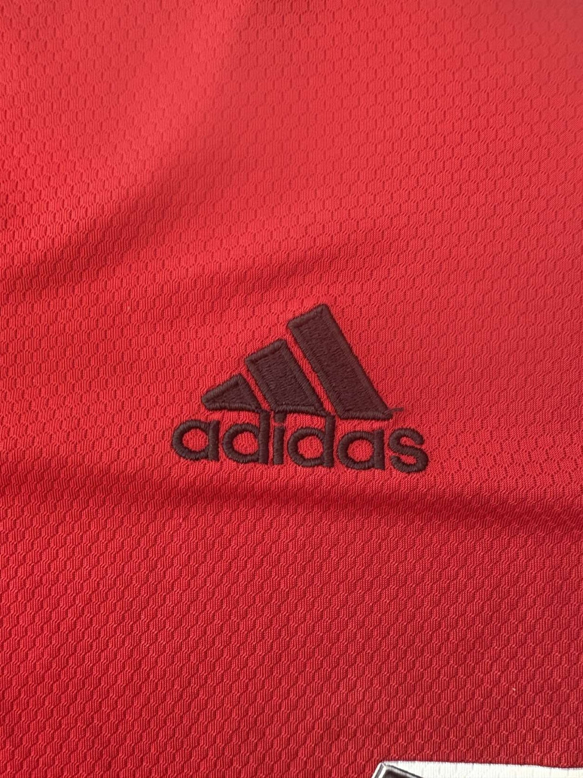 adidas branding on the Manchester United shirt