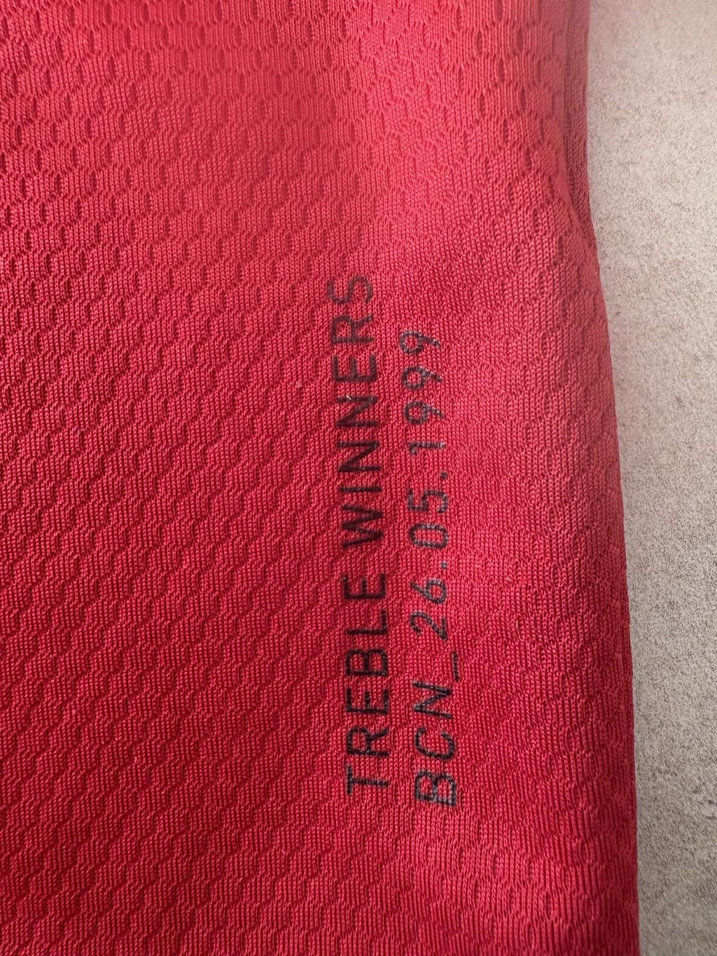 Treble commemorative date detail on the Manchester United shirt
