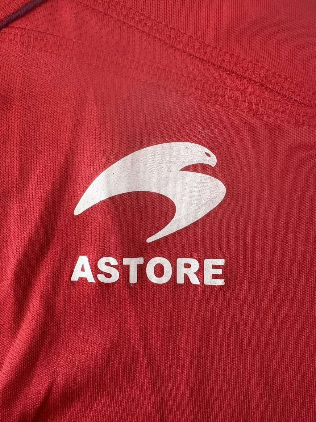 Astore branding on the Osasuna home shirt