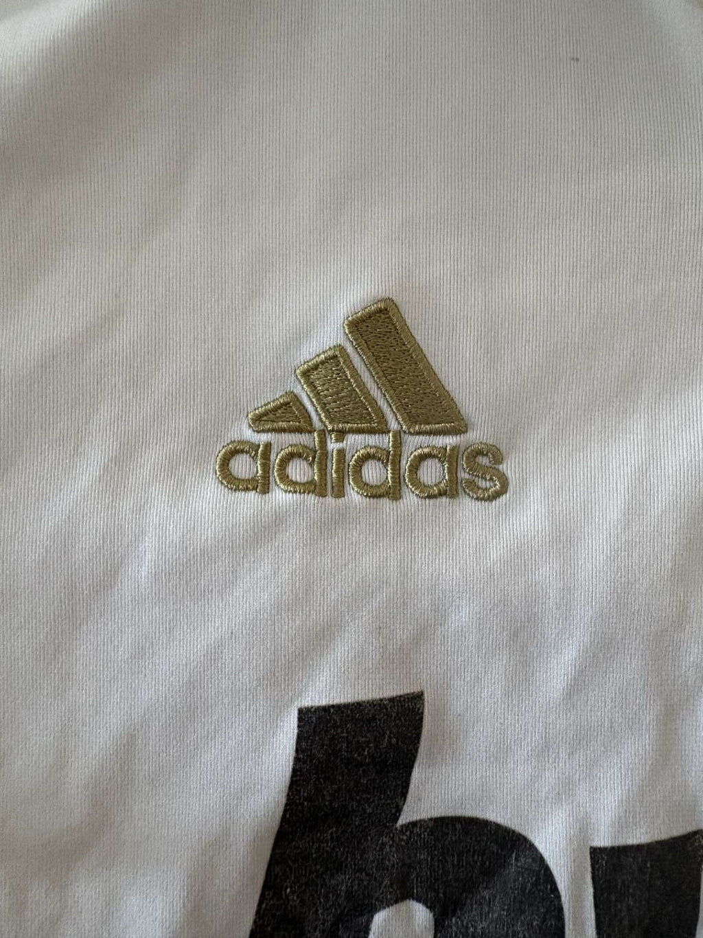 adidas branding on the 2011/12 Real Madrid home shirt