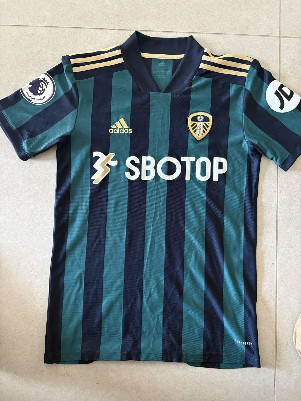 2020/21 Leeds United away shirt, front, adidas with SBOTOP sponsor