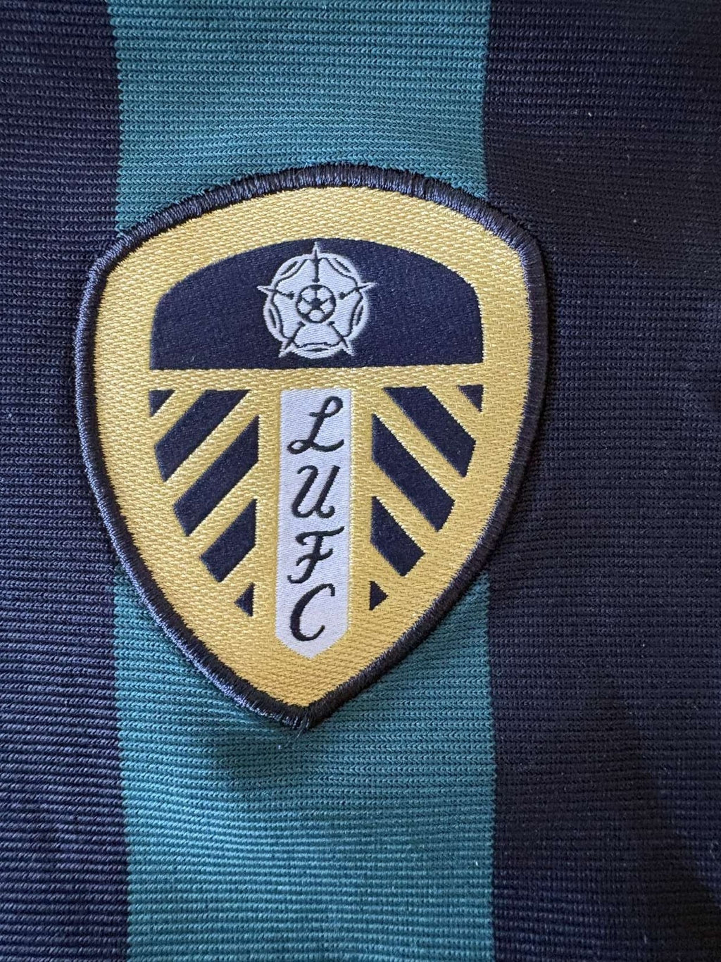 Leeds United crest on the 2020/21 away shirt