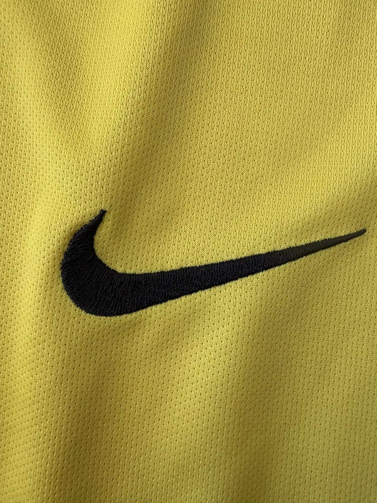 Nike branding on the Manchester City goalkeeper shirt